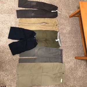 5 pairs of boys pants and 1 pair of shorts